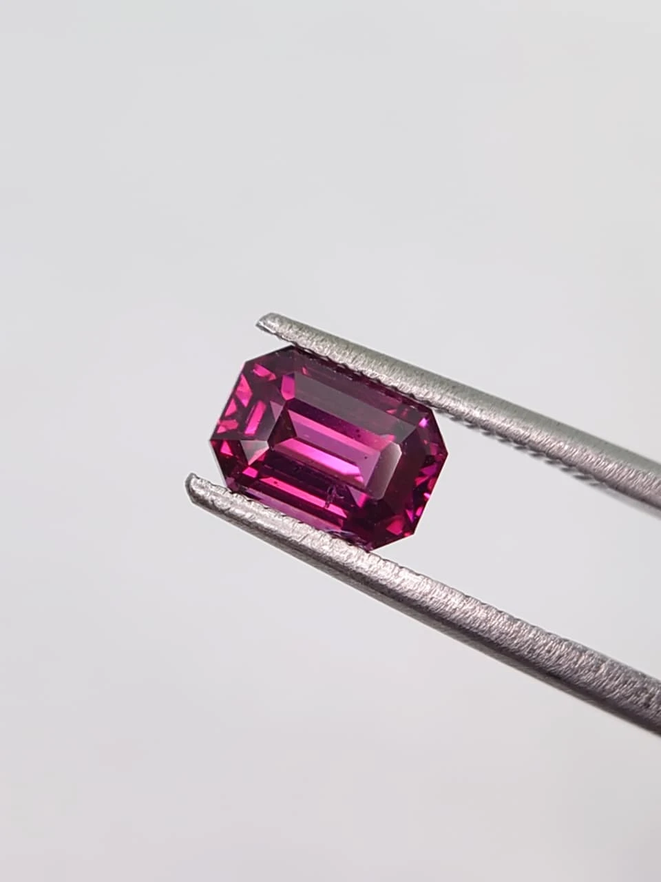 1.8ct Natural Emerald Cut Faceted Malaya Garnet from Tanzania — view 3